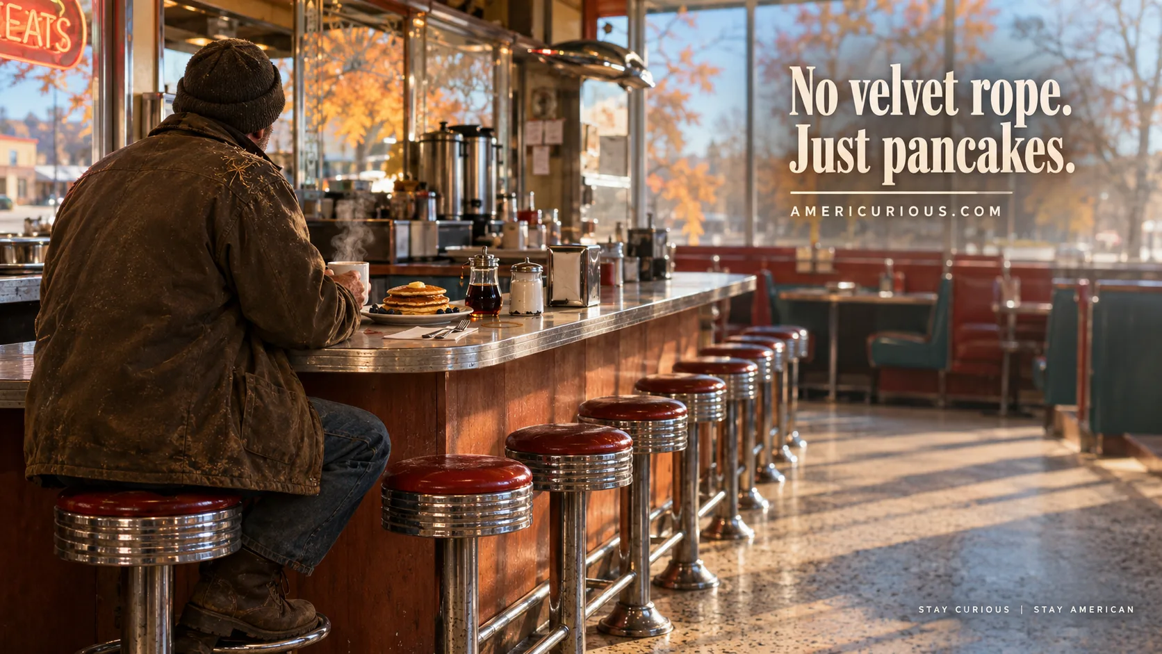 Chrome-and-neon diner counter in Millbrook, NY at sunrise — pancakes, a lone customer in a barn coat, and bare maples through the glass — the hero image for americurious.com's guide to the Hudson Valley's quietest upscale village. Stay Curious | Stay American