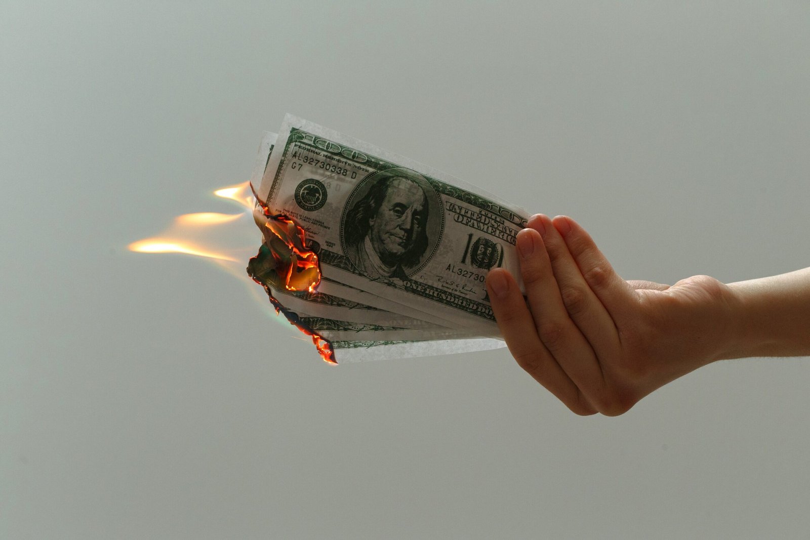 photography-of-several-burning-us-dollar-banknotes